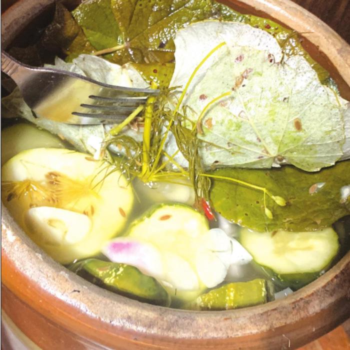 I seasoned this batch of crock pickles with sliced red onion, sliced garlic, red pepper, black peppercorns and dill. Photo by Andy Behlen