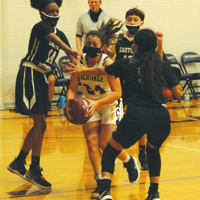 La Grange’s Kalyn Ortiz was able to get to the basket past this Eastside triple-team Tuesday.
