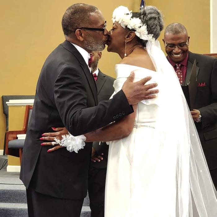 The author of this piece, Verlia Mosley-Rhodes, and her husband Gregory at their wedding, two Februaries ago.