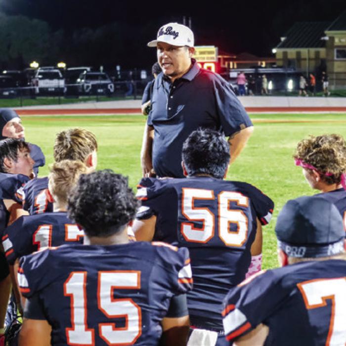 Schulenburg’s interim head football coach, Marty Bigham, speaks to the team after Friday’s loss. Photo by Andy Behlen