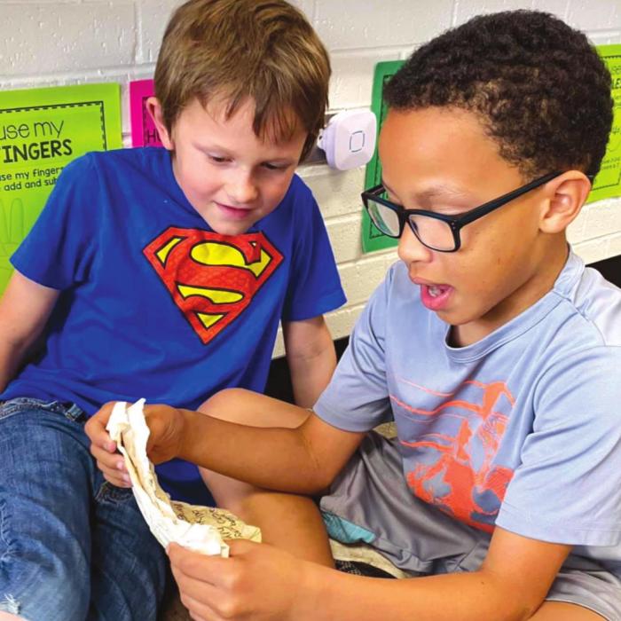Fayetteville fourth graders reading from their journals.