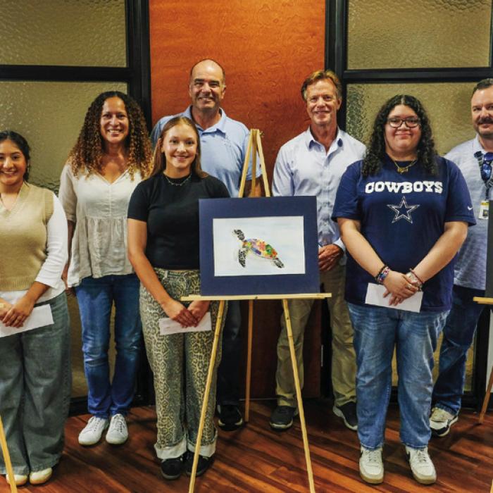 The owners of the St. Mark’s Medical Office Building held an art contest for La Grange High School students. The winning art will be on display inside the building. Pictured are (front, from left) first place winner Camila Vega, second place winner Kyla Colon, third place winner Natalie Rios, (back) building owners Marian Mason, Paul Mason and Guy Brazell, and La Grange High School art teacher Jack Vollbaum. Photo by Andy Behlen