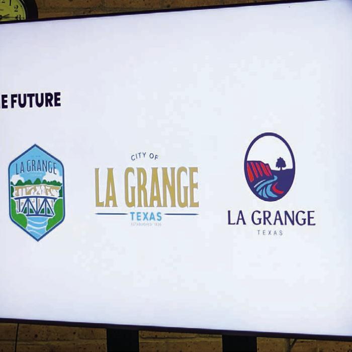 La Grange City Council considered three options for a new town logo at their meeting Monday night. The Council picked the one on the left – a shield depicting the Bluff and a bridge across the Colorado River surrounded by trees and a blue skyline. Photo by Andy Behlen