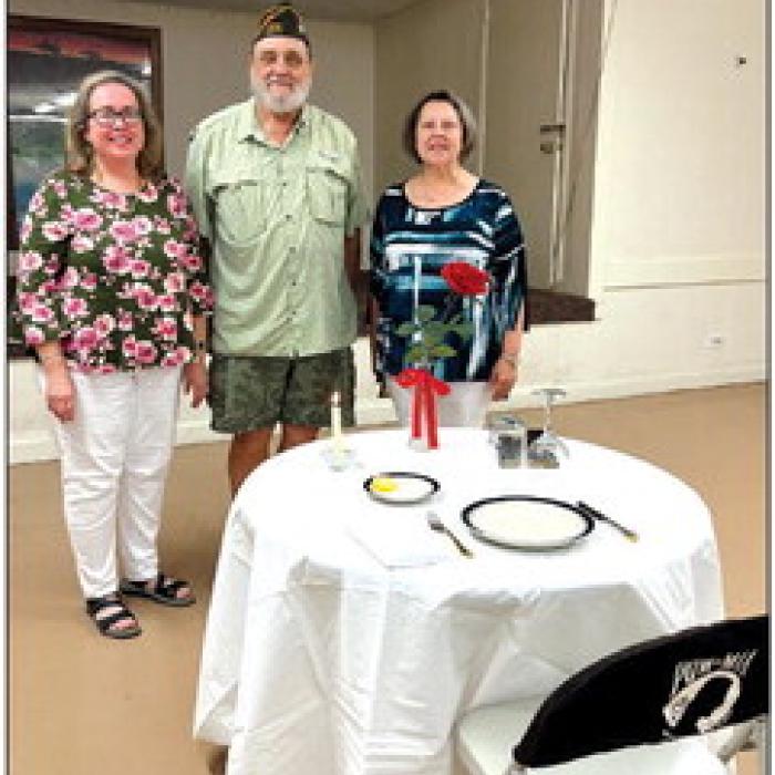 VFW Fayette Memorial Post No. 5254 and Auxiliary of La Grange held a POW/MIA Remembrance Ceremony at their Tuesday, Sept. 20 monthly meetings. From left, Auxiliary Secretary Elizabeth Kallus, VFW Commander Andy Kruppa, and Auxiliary President Marilyn Kothmann presented the solemn ceremony that represents saving a place for the missing man. Until the day they come home, we are to Remember.