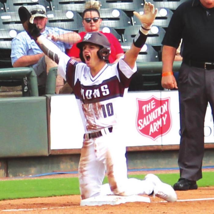 Travis Gully celebrates reaching third base in the second inning. He reached base all four times he came up to bat in the title game.