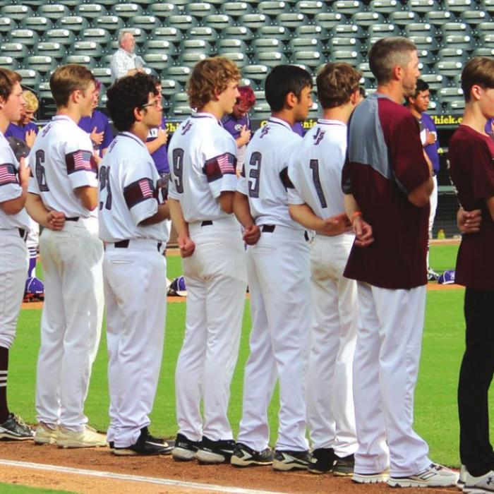 The Lions line up for the national anthem prior to the start of Thursday’s title game.