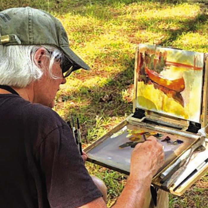 Linda Dellandre painting en plein air.