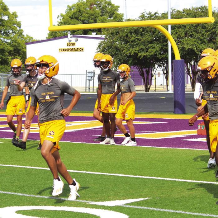 Images from Monday’s first day of high school practice in La Grange. Photo by Jeff Wick