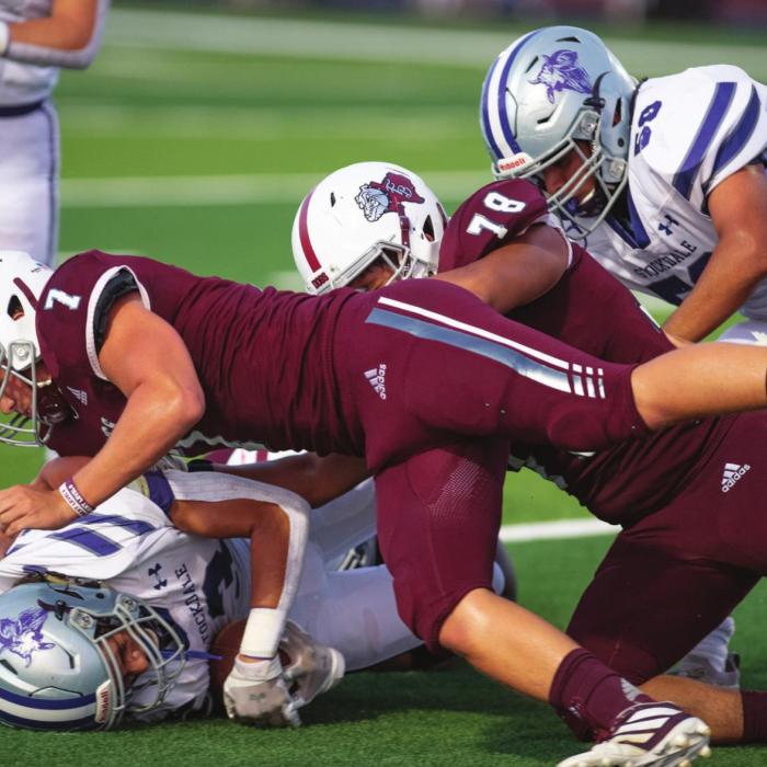 Dayton Cliffe makes the tackle with assistance from Oscar Romero for Flatonia in Friday night’s homecoming victory. Photo by Stephanie Steinhauser