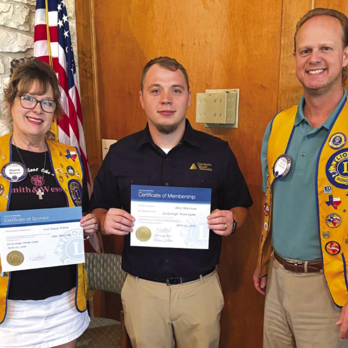 The La Grange Noon Lions Club welcomed Alex Morrison to the club. Alex is the Sales Manager with Colorado Valley Communications and has lived in La Grange for four years with his wife and family. Pictured are Lion Diana Wilson and David Wagner.