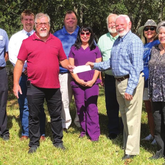 Harvey House Donation Made to Habitat