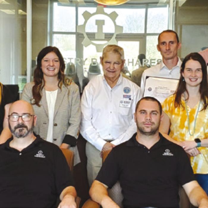 Pictured front from left: Frank Wolf (Navy, 9 years), Seth Dalton (Army, 4 years) Brandon Canik (Air Force 3 years, Texas Air National Guard 6 years), and Tyler Poli (Navy, 10 years, Reserves 8 years); back row: Megan Busa, Brian Hobart, Katherine Green, Michelle Hodge, George Nami, Jeremy Pietsch, Emilie Canik, Mike Mueller, Beth Martin, Andrew Swansey, Josh Werland and Carrie Hardy. Not pictured: Kaleb Bornefeld (Army, 4 years).