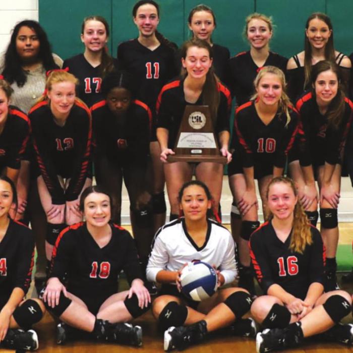 The members of the Schulenburg volleyball team hold up their regional runner-up trophy after Saturday’s loss to Thrall in the regional finals. Photo by Audrey Kristynik