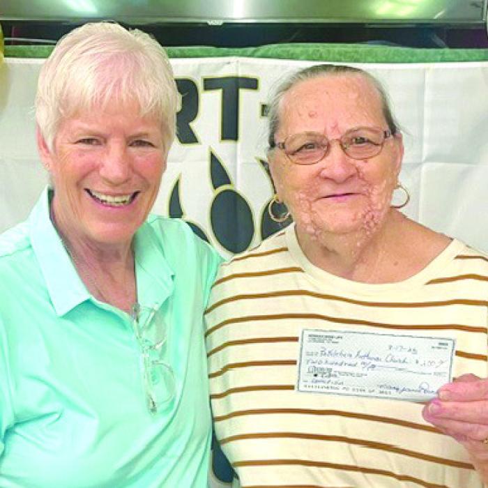 Mary Rauch (right), from Round Top Hermann Sons Life, presented a donation to Bethlehem Lutheran Church. Accepting the donation was Church Council member, Julie Wantland (left).