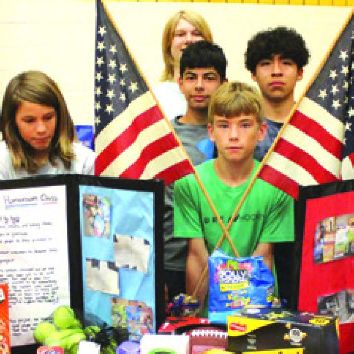 Mrs. Landis’ homeroom class got people to donate snacks and sports equipment for soldiers overseas and also wrote letters to them.