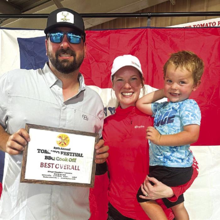 Brock, Valerie and Brant Otto with the Best Overall BBQ plaque.