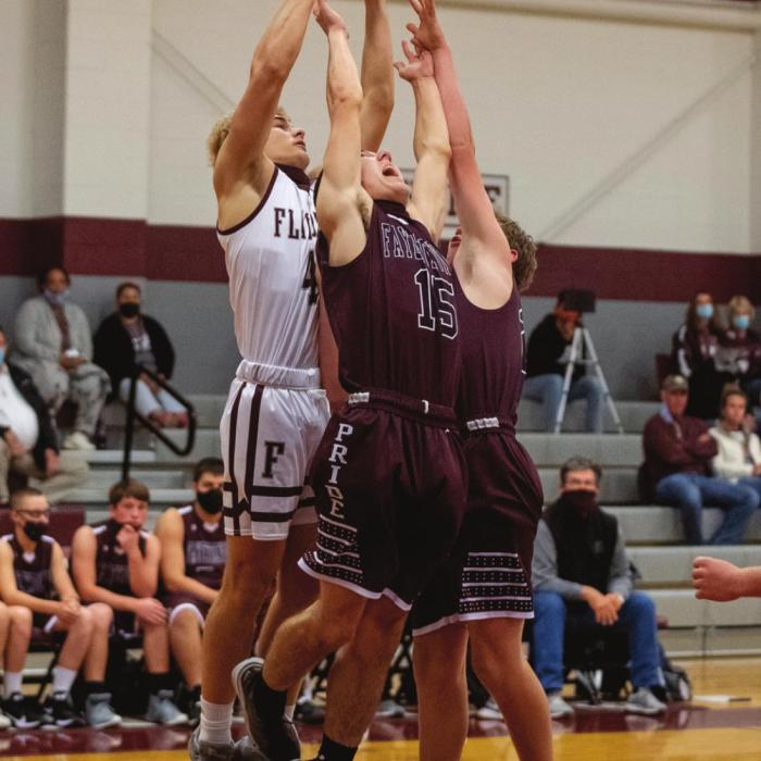 Flatonia’s Holden Kloesel goes up for two in the midst of Fayettville’s defense. Photo by Stephanie Steinhauser