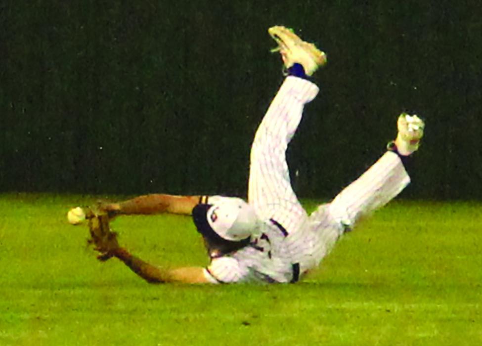 La Grange’s Max Dixon just missed making this spectacular diving catch on what would have been the final out in Tuesday’s game.
