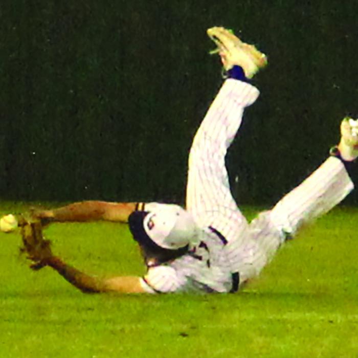 La Grange’s Max Dixon just missed making this spectacular diving catch on what would have been the final out in Tuesday’s game.