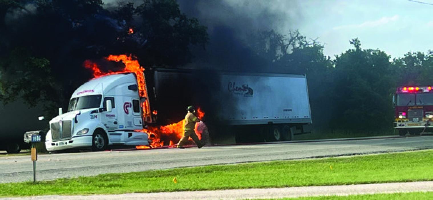 An 18-wheeler burned Monday afternoon on the north side of La Grange after a flat tire got hot and caught fire. Photo by Todd Keilers