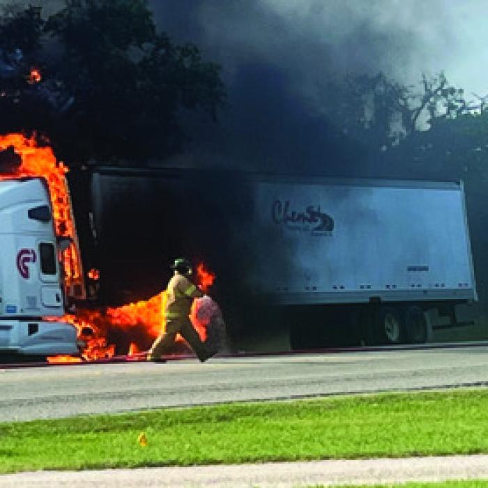An 18-wheeler burned Monday afternoon on the north side of La Grange after a flat tire got hot and caught fire. Photo by Todd Keilers