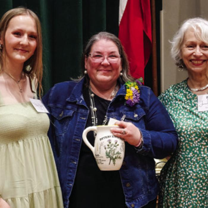TWL presented an award to Christi Opiela for determination. Pictured are (from left) award presenter Olivia Weiser, Opiela and TWL chapter co-president Janis Richardson. Photos by Andy Behlen