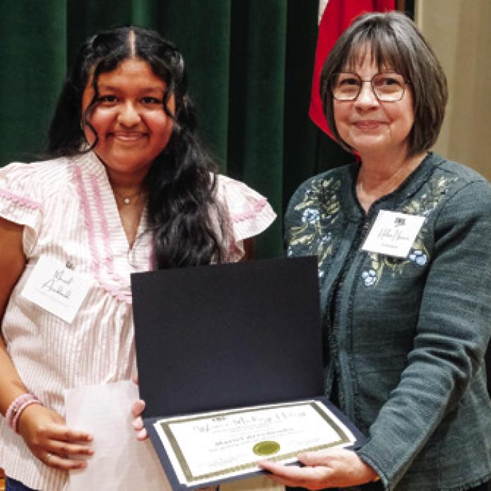 TWL presented a student writing showcase award to Mariel Arredondo of Yoakum High School for an essay about Clara Belle Drisdale Williams. Pictured (from left) are Arredondo and TWL chapter co-president Helen Niesner.