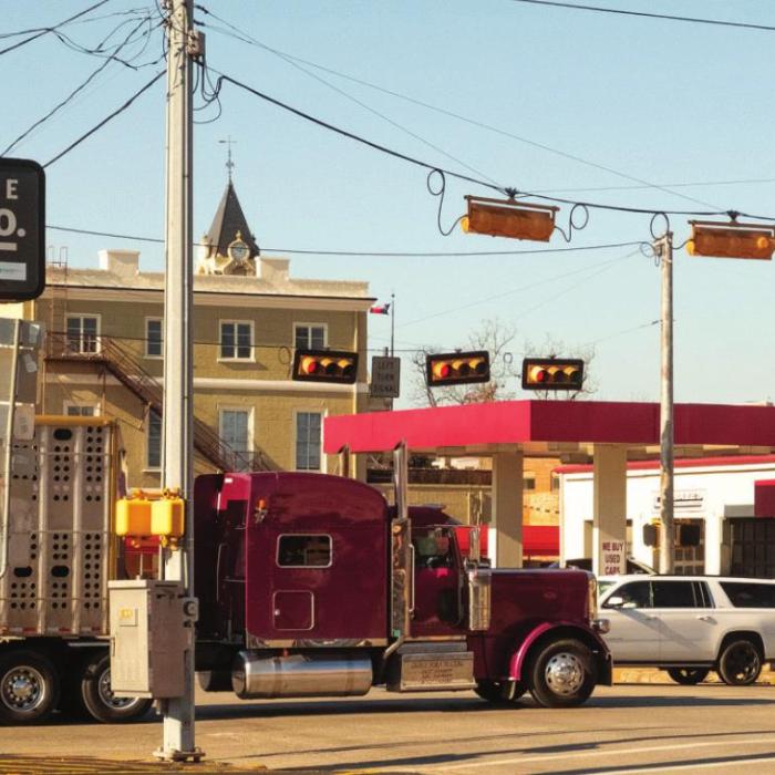 Big trucks have a hard time turning at the intersection of Travis and Jefferson (TX 71 and US 77). Texas Department of Transportation is planning to purchase property to widen the intersection. Photo by Andy Behlen