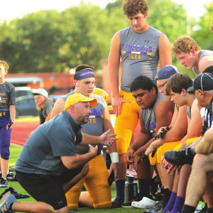 La Grange assistant coach Robert Barber talks to some players during Friday’s scrimmage in El Campo. Photos by Darrell D. Gest