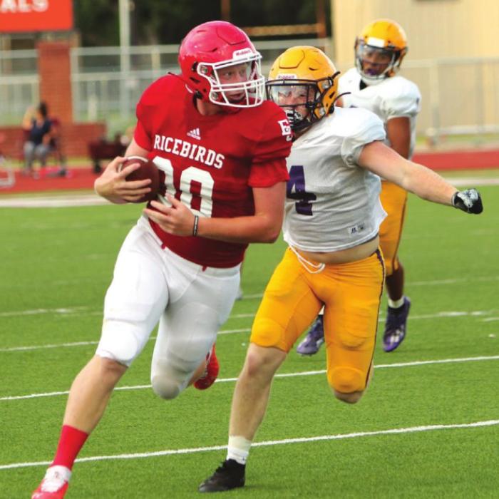 La Grange’s Ryder Imhoff pursues an El Campo ballcarrier.