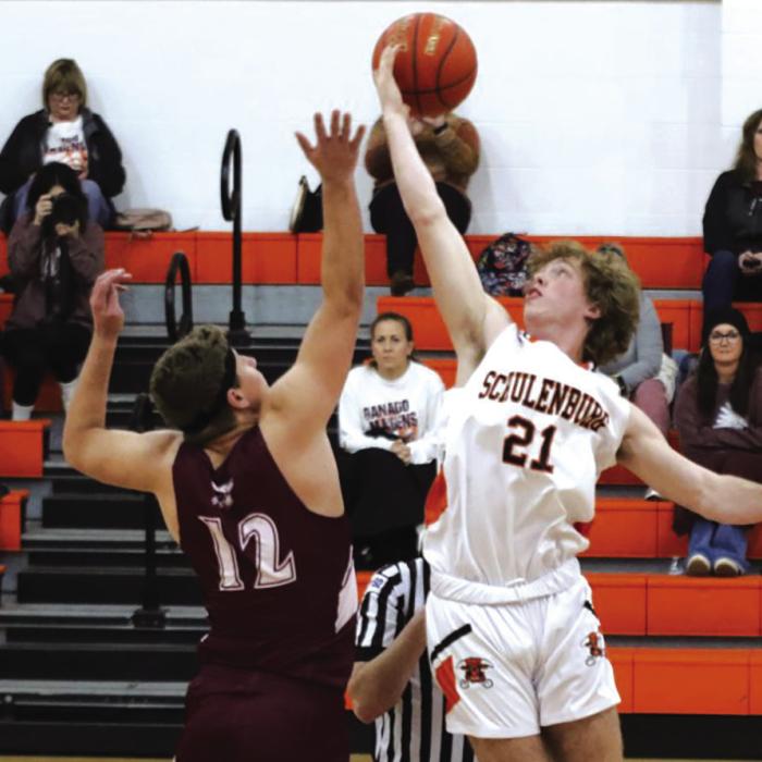 Schulenburg’s Kenny Schramek wins the opening tip-off in Tuesday’s game against Ganado. The Shorthorns won 68-51 to improve to 14-5 overall and 5-1 in district. Photo by Audrey Kristynik