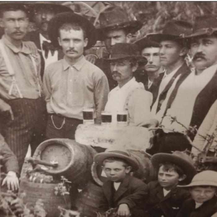 Heinrich Kreische’s ultra dark German beer sitting atop a block of ice as lots of friends pose for a photo. It is this traditional style beer that Twisted X Brewing is formulating for their next project. Photo courtesy of Brian Bush
