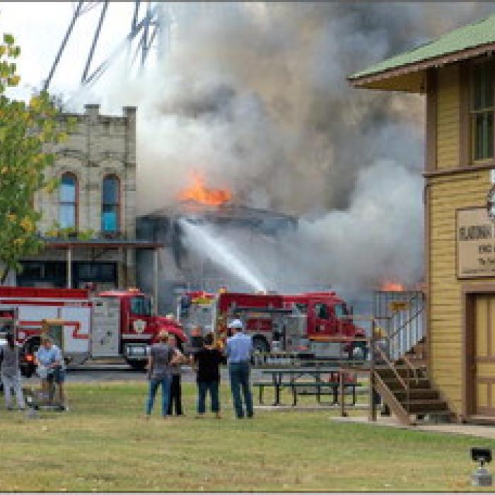 Townspeople gathered downtown on Monday to watch the fire in downtown Flatonia. Photos by Andy Behlen