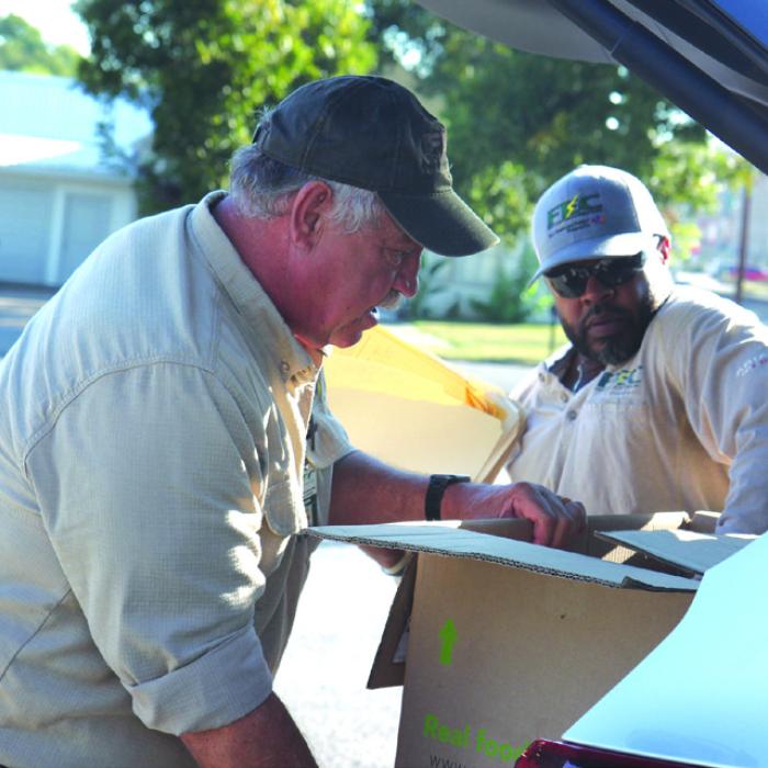 Fayette Electric Employees Larry Sulak and Macy Scott.