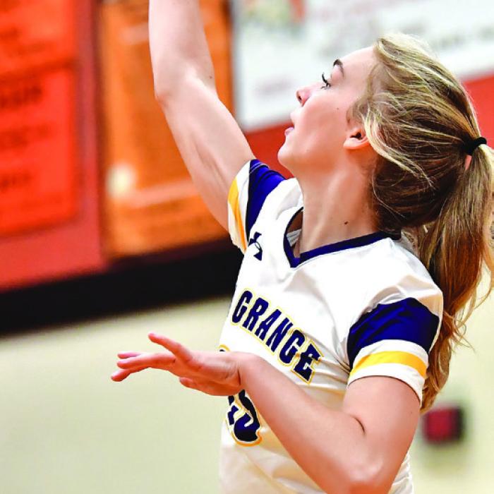 La Grange’s Kylie Trlicek serves the ball in Tuesday’s win.