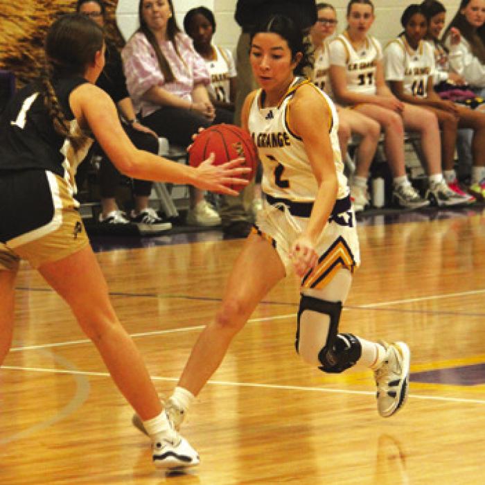 La Grange’s Landri Hernandez drives the ball down the court Friday. Photo by Jeff Wick