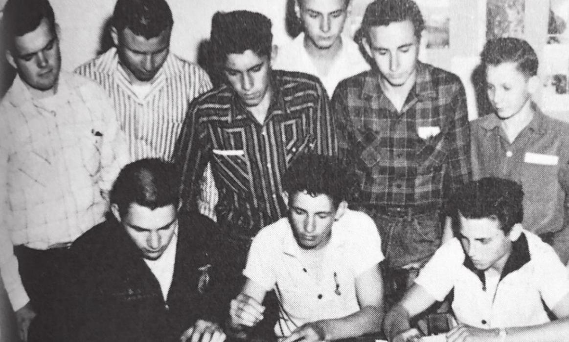 In a 1957 Schulenburg High School FFA class, (left to right): Eugene Matura, Glenn Ahrens, Leo Wick, Willie Rainosek, Elton Kaase, Jimmie Pavlik, Leonard Korenek, James Brossmann, Elroy Kahanek and Robert Muras perform milk tests.