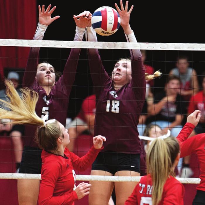 Karli Siptak and Camryn Smith go up for a solid block against Shiner, St. Paul in Tuesday nights win. Photo by Stephanie Steinhauser