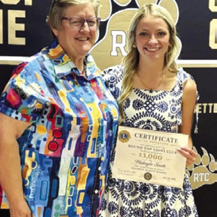 Susan Weyand presented the Round Top Lion’s Club scholarship to Makayla Smith at the RT-C Academic Awards Banquet on May 6.