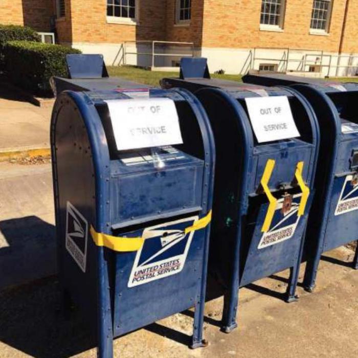 Two of the three drop-off mail boxes along Jefferson St at the La Grange post office were broken into this week. Photo by Bobby Bedient