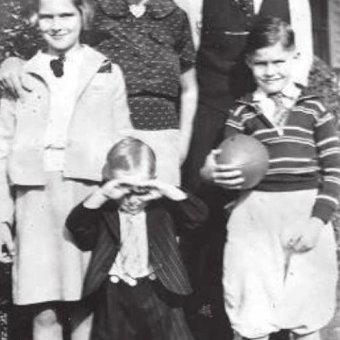 Moose was still wearing short pants when this photo of his parents, sister Florice and older brother Billy Mike was taken.