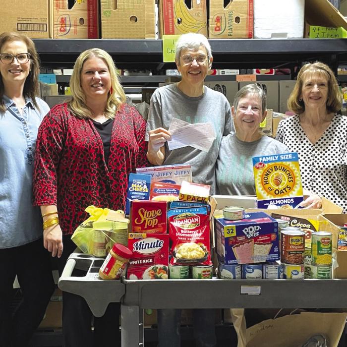 The Round Top and La Grange offices of Round Top State Bank recently held a Food Drive to benefit the AMEN Food Pantry. In addition to food items, monetary donations were also accepted with matching funds provided by Round Top State Bank. Shown from left: Michele Pietsch Stokes – RTSB, Lyndsey Vasek – RTSB, Susan Schultz – AMEN, Mary Lou McElroy – AMEN and Sharon Chovanec – RTSB.