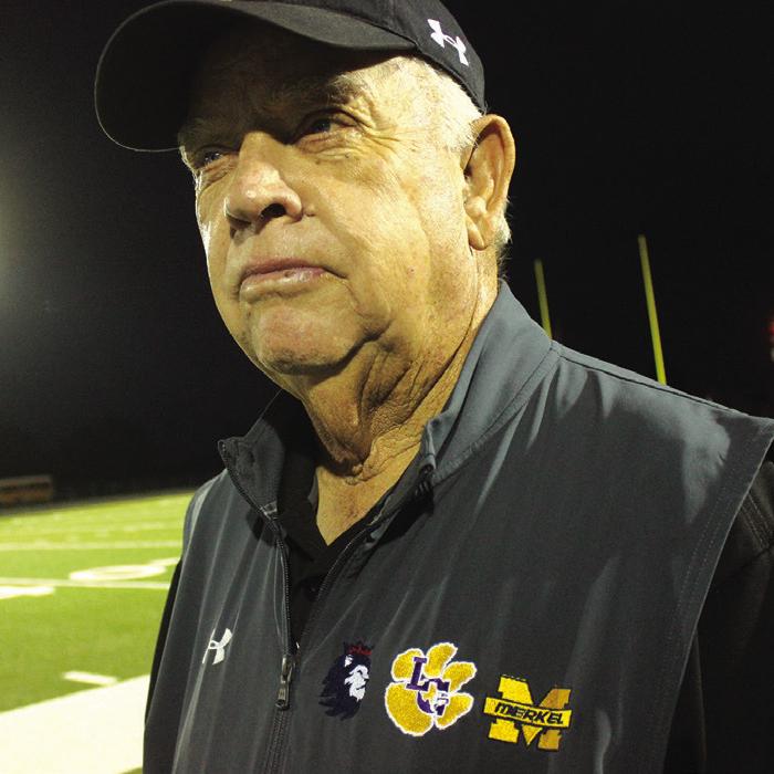 George Kates is shown here on the sidelines at Leopard Stadium with a pullover that his son Matt bought him that has logos of all three teams where his sons are head coaches. Photo by Jeff Wick