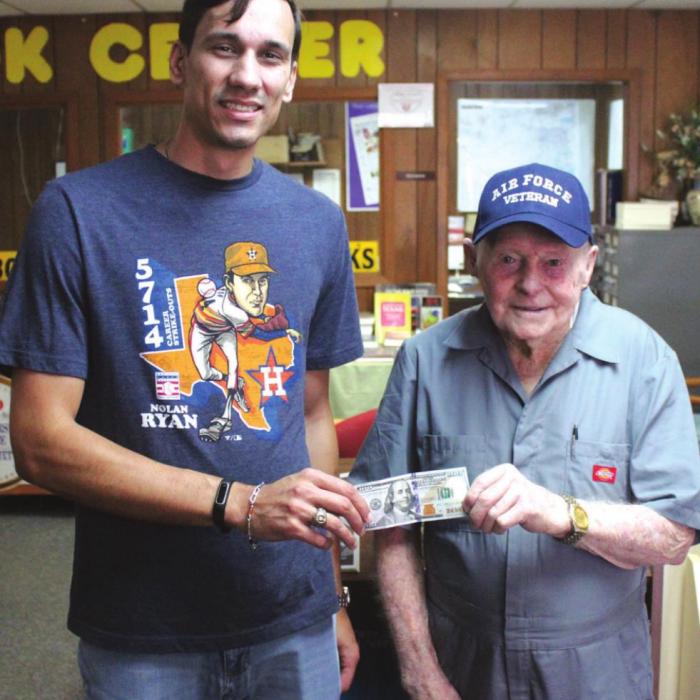 Newcomb Wins $100