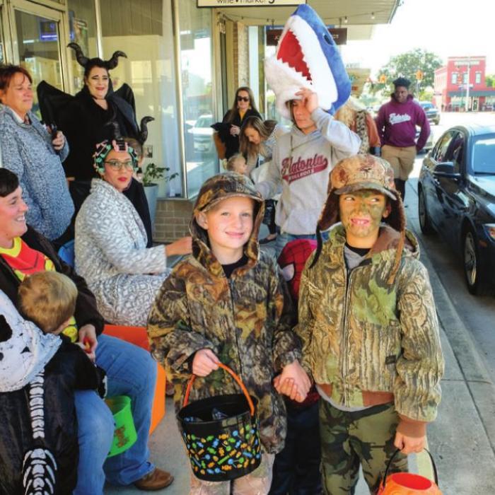 The festivities that occur downtown as part of Main Street’s Trick-or-Treat on the Square (like these trick-or-treaters from last year) will not happen this year because of COVID concerns. Some virtual events are planned. Record file photo