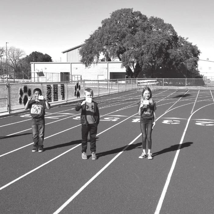 An example of some of the Flatonia students participating in the Marathon Kids program, left to right: LeAnthony Anderson (3rd grader), Isaiah Tovar (3rd grader), Gage Grahmann (2nd grader), Stassney Ahrens (3rd grader) and Briana Pavlica (3rd grader)