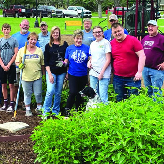 Lions Work On Butterfly Garden in LG