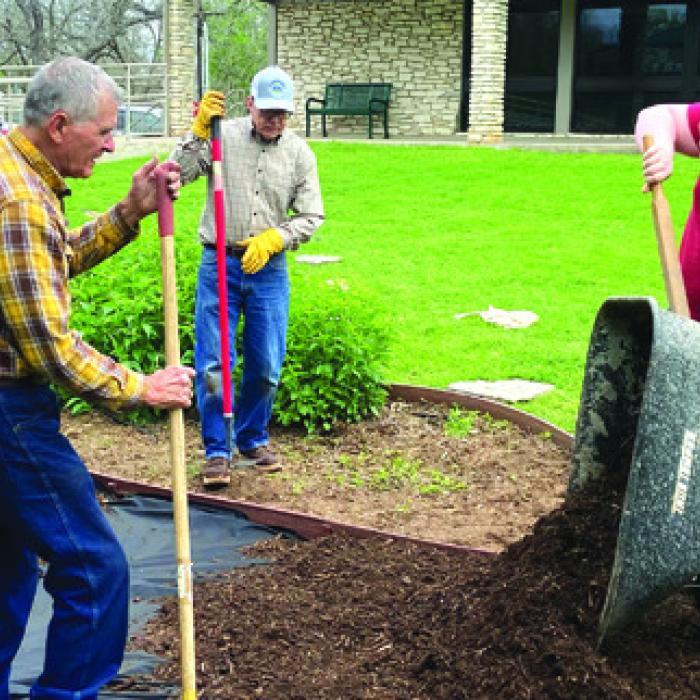 Lions Work On Butterfly Garden in LG