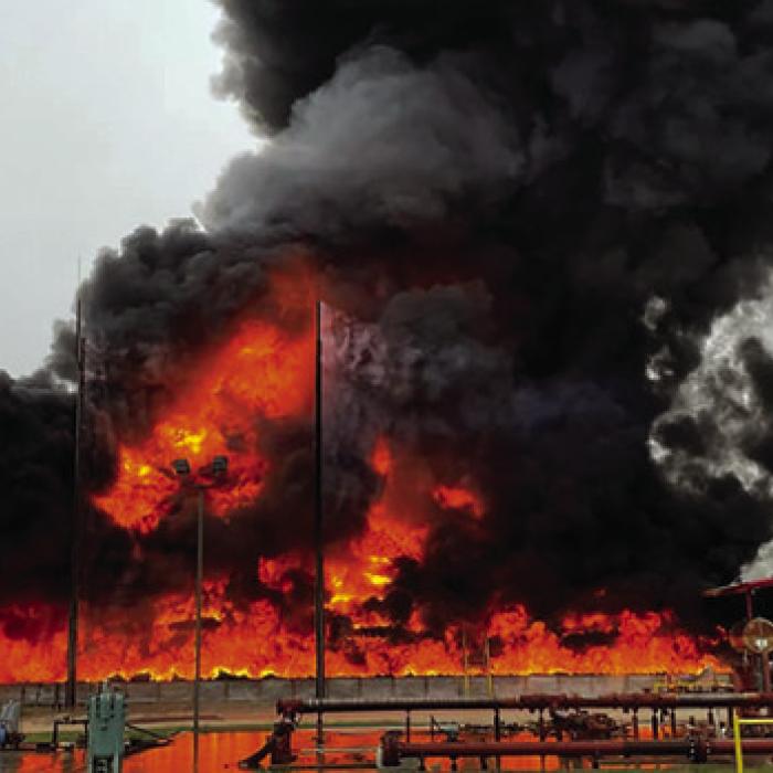 Lightning sparked this fire at a oil well site north of Flatonia.