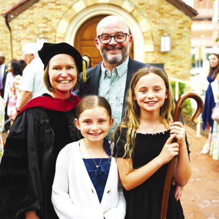 Pastor Jen Kindsvatter graduated from Austin Presbyterian Theological Seminary on May 17, with her Doctor of Ministry degree. Jen serves as the pastor of Shared Lutheran Ministry of Fayette County. She is pictured here with her spouse, Matt, and their daughters Emma and Lily.